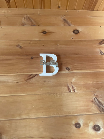 Large first initial and name printed on top