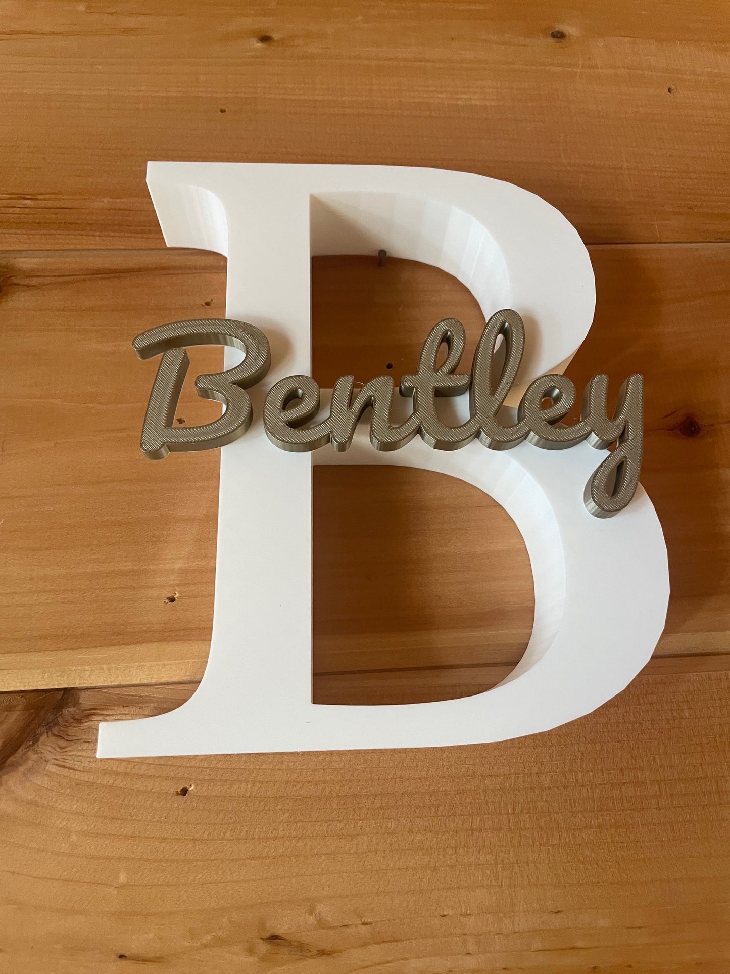 Large first initial and name printed on top