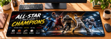 All-Star Multi-Sport Champions Desk Mat in use on a warm wood office desk — overhead workspace view