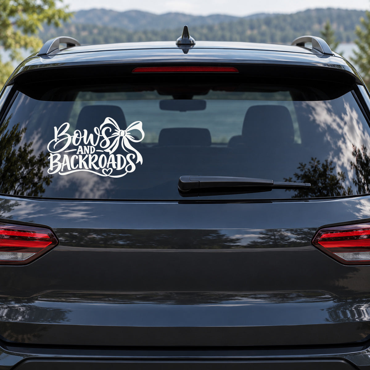 Bows and Backroads Car Window Decal shown on a vehicle window