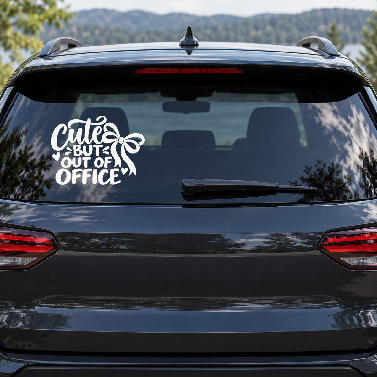 Cute but Out of Office Car Window Decal shown on a vehicle window