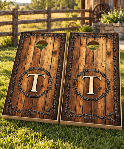 Two matching barbed wire monogram wraps on boards; boards not included