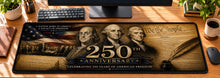 Founding Fathers Tribute Desk Mat in use on a warm wood office desk — overhead workspace view