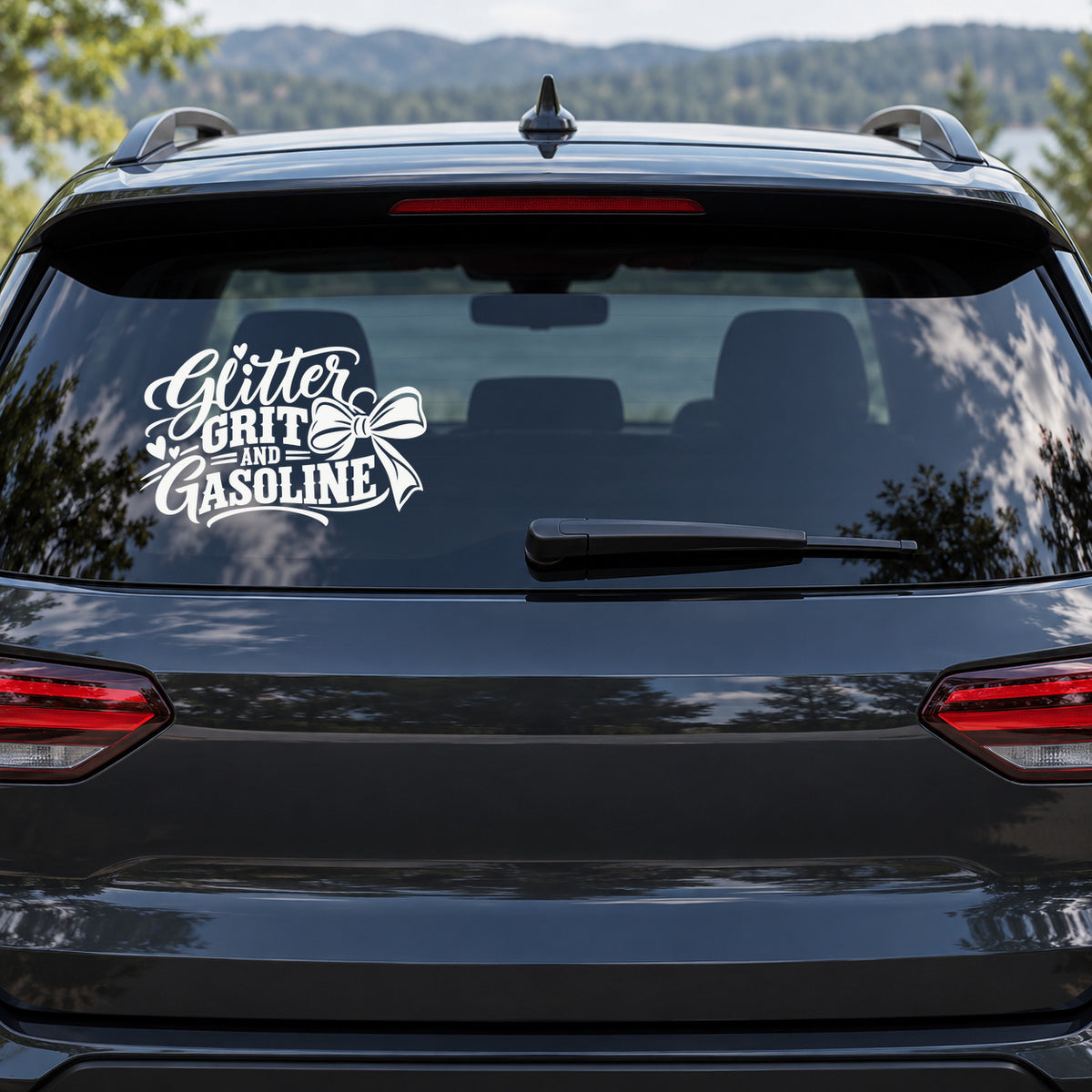 Glitter Grit and Gasoline Car Window Decal shown on a vehicle window