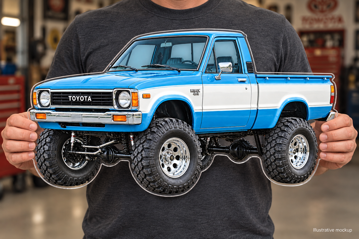 1979 Toyota Hilux Sky Blue and White acrylic truck sign held mockup
