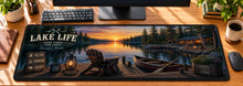 Lake Life Dockside Serenity Desk Mat in use on a warm wood office desk — overhead workspace view