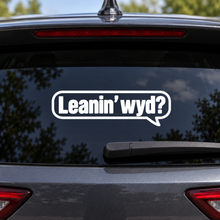 White Leanin’ wyd? speech-bubble decal on dark rear vehicle glass