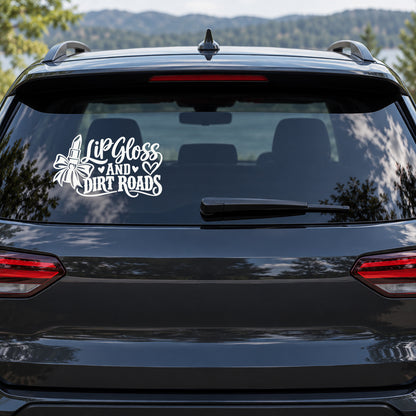 Lip Gloss and Dirt Roads Car Window Decal shown on a vehicle window