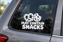 MAY CONTAIN SNACKS contour cut car window decal shown in white