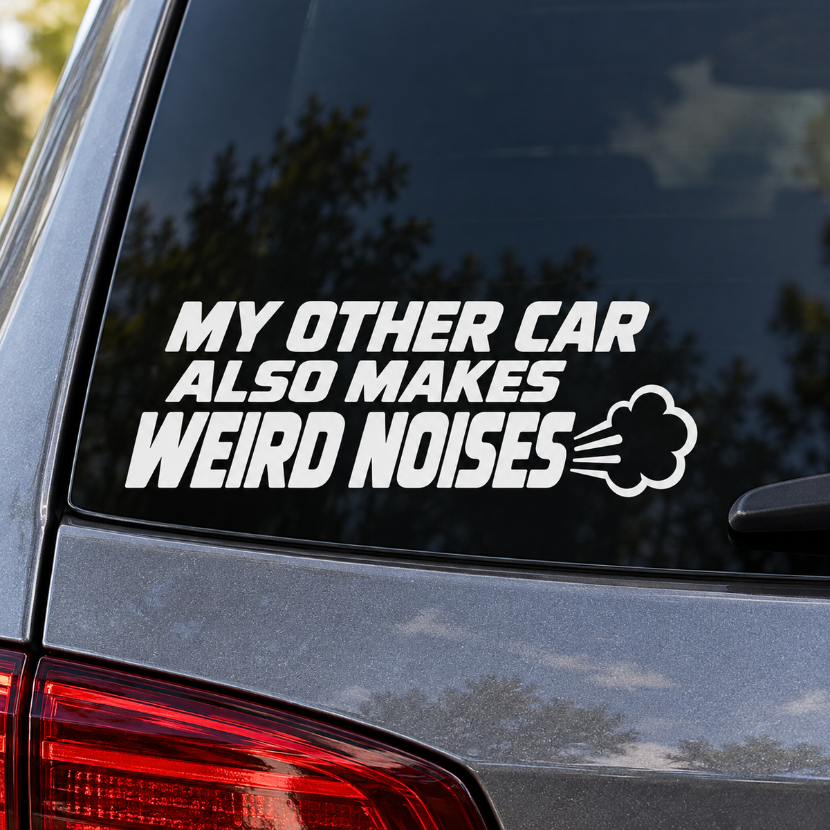 My Other Car Also Makes Weird Noises white lettering on a car window