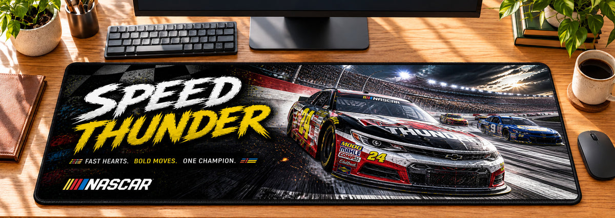 NASCAR Speed Track Thunder Desk Mat in use on a warm wood office desk — overhead workspace view