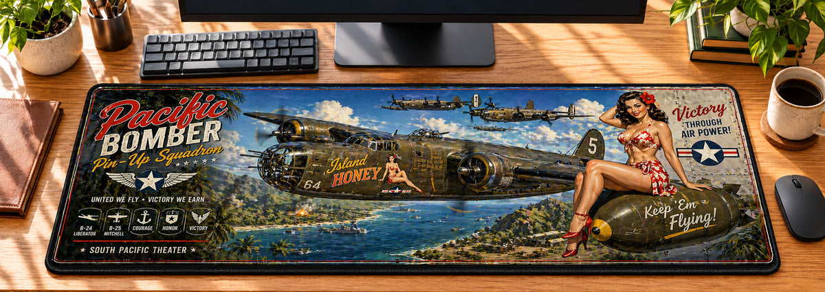Pacific Bomber Pin-Up Squadron Desk Mat in use on a warm wood office desk — overhead workspace view