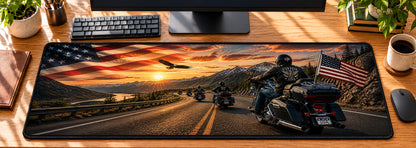 Patriot Rider USA Desk Mat in use on a warm wood office desk — overhead workspace view