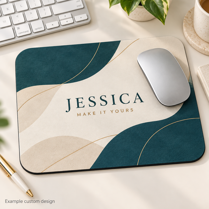Example custom name mouse pad with teal and cream artwork on a desk