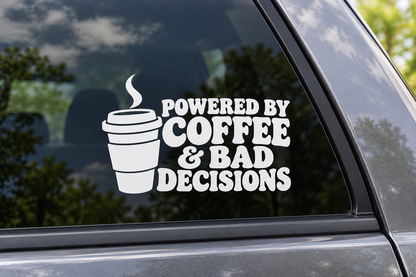 POWERED BY COFFEE & BAD DECISIONS contour cut car window decal shown in white
