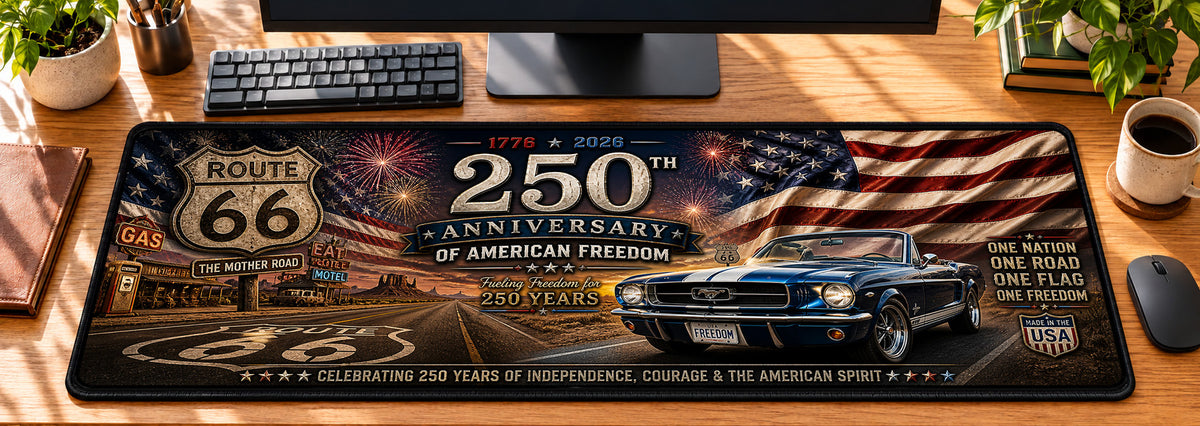 Route 66 Freedom Ride Desk Mat in use on a warm wood office desk — overhead workspace view
