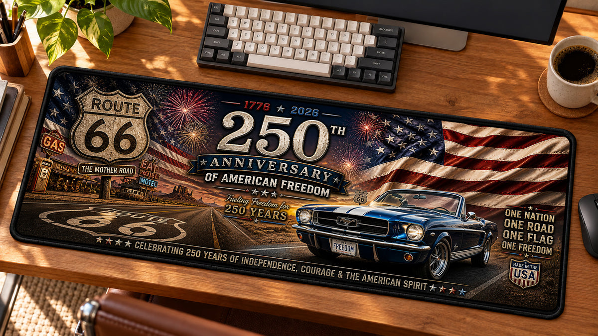 Route 66 Freedom Ride Desk Mat in use on a warm wood office desk — angled workspace view