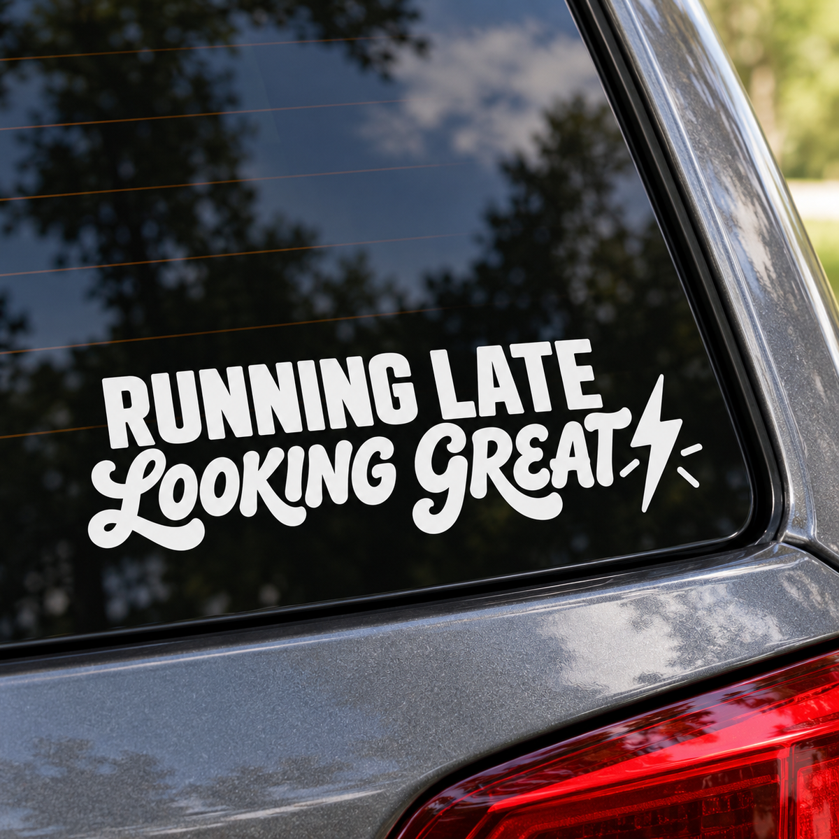 Running Late Looking Great white lettering on a car window