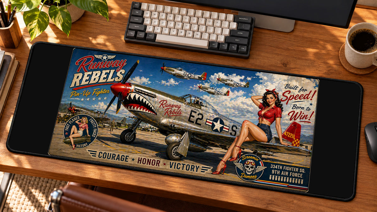 Runway Rebels Pin-Up Fighter Desk Mat in use on a warm wood office desk — angled workspace view