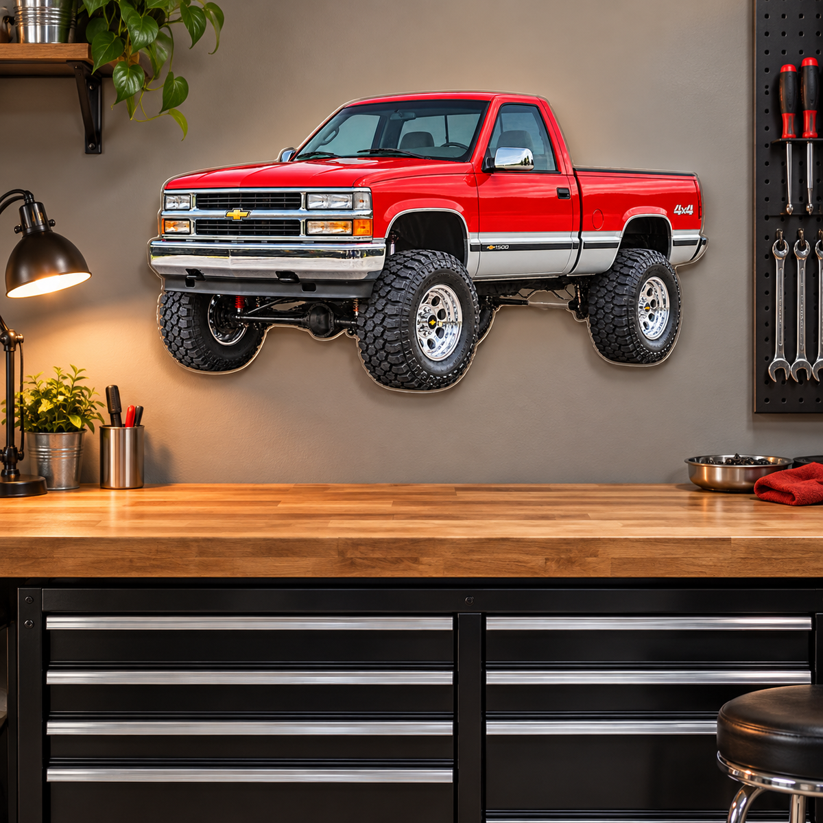 1996 Chevrolet Silverado acrylic sign floating above a garage workbench