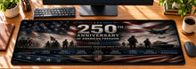 Stars & Stripes Battlefield Honor Desk Mat in use on a warm wood office desk — overhead workspace view