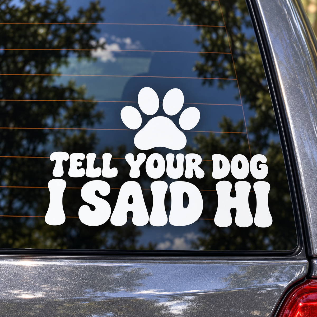 Tell Your Dog I Said Hi contour cut window decal shown in white