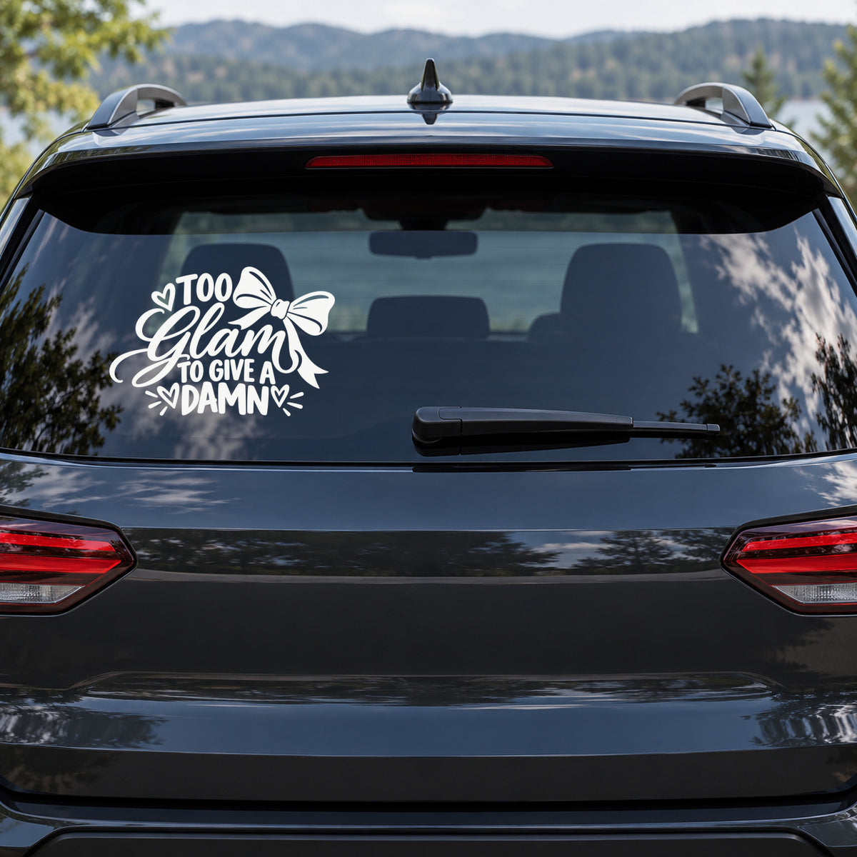 Too Glam to Give a Damn Car Window Decal shown on a vehicle window