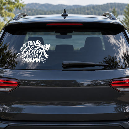Too Glam to Give a Damn Car Window Decal shown on a vehicle window