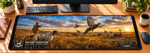 Upland Bird Field Hunt Desk Mat in use on a warm wood office desk — overhead workspace view