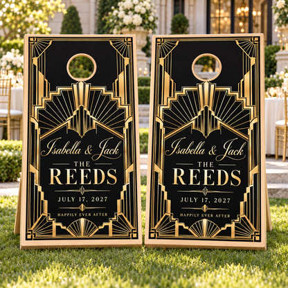 Two matching art deco gold personalized wedding cornhole board wraps on boards at a wedding; boards not included