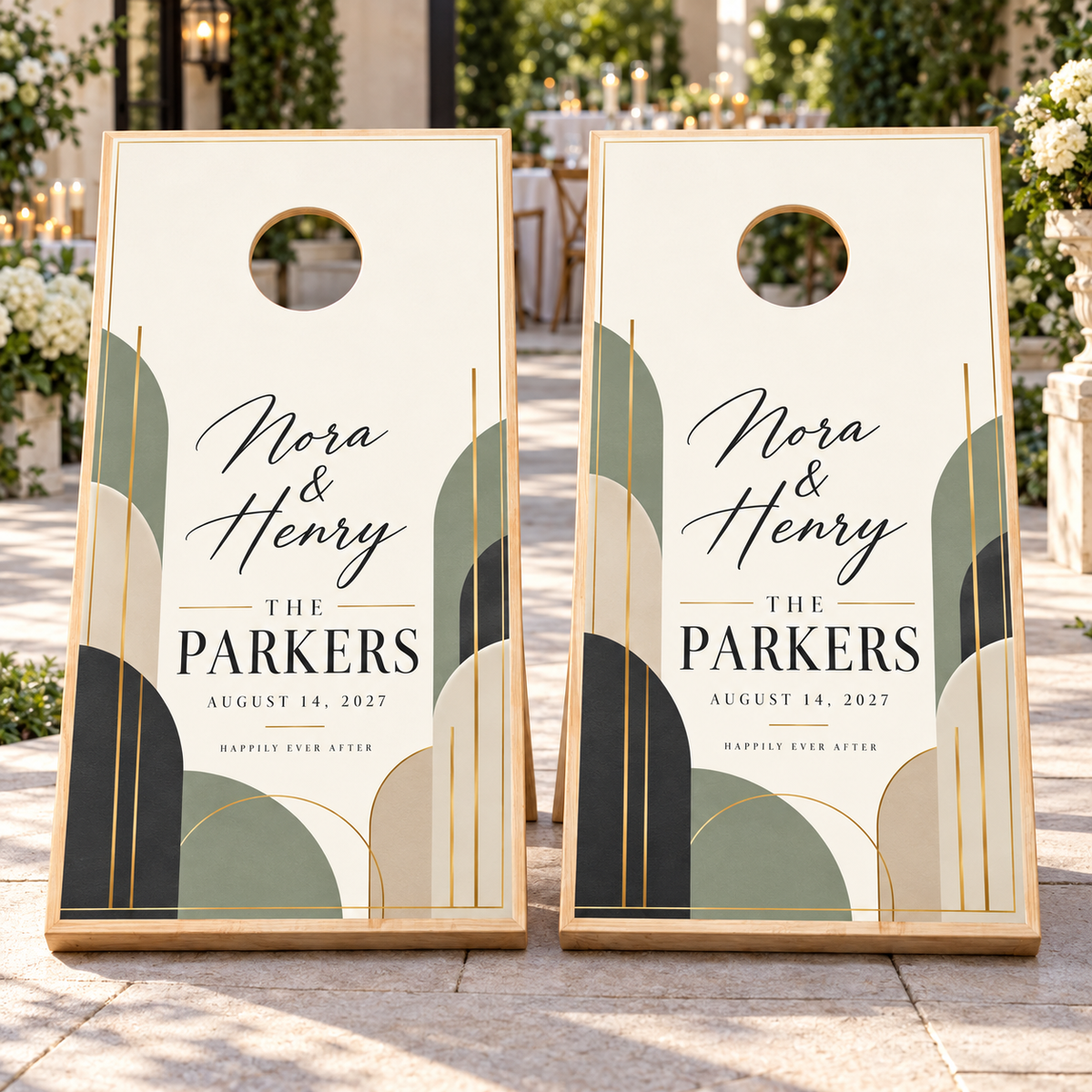 Two matching modern geometric personalized wedding cornhole board wraps on boards at a wedding; boards not included