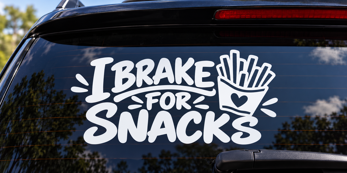 I Brake for Snacks Funny Car Window Decal shown on a car window