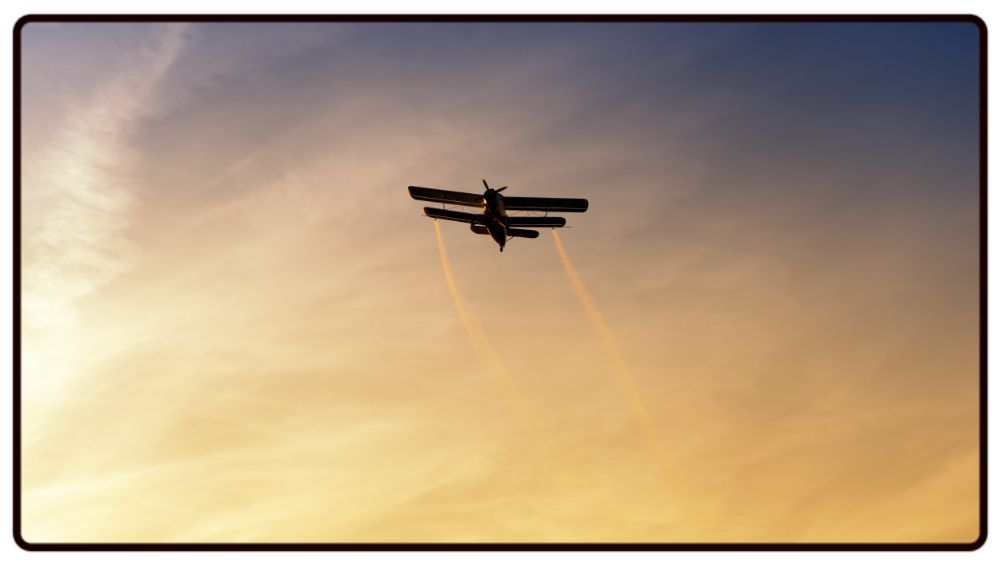 Biplane Sunset Desk Mat
