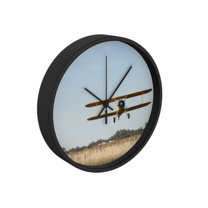 Stearman Biplane Over a Field 10 inch wall clock