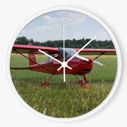 Red Plane On the Grass 10 inch wall clock