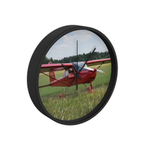 Red Plane On the Grass 10 inch wall clock