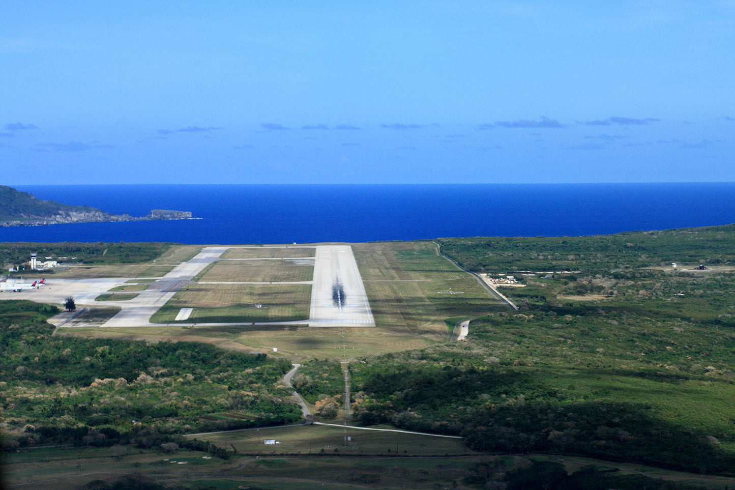 Airport Runway on the Edge of the Ocean Wall Mural