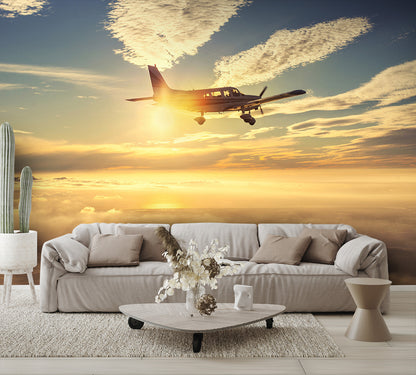 Small Airplane Flying at Sunset Clouds Wall Mural