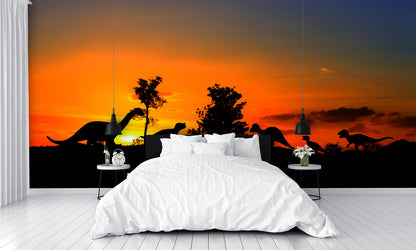Silhouettes of Dinosaurs in the Forest on Sunset Wall Mural
