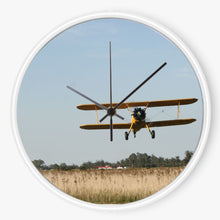 Stearman Biplane Over a Field 10 inch wall clock