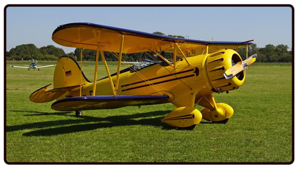Yellow Waco Biplane Desk Mat