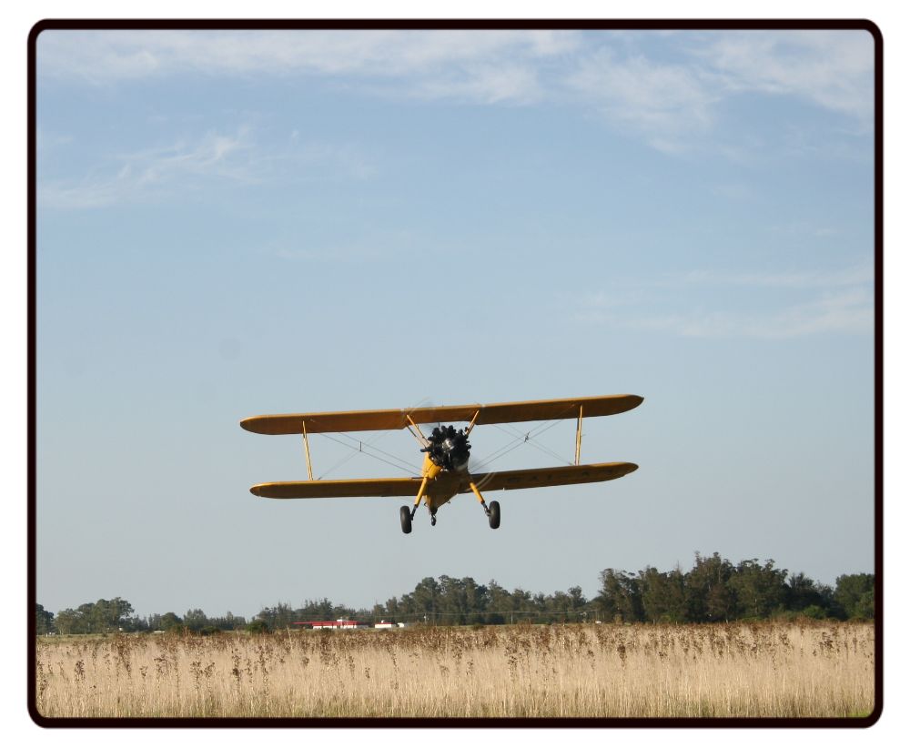 Stearman Plane Over a Field Desk Mat