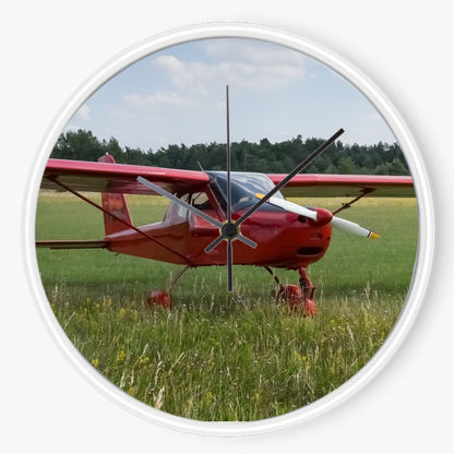 Red Plane On the Grass 10 inch wall clock