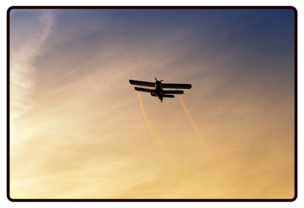 Biplane Sunset Desk Mat