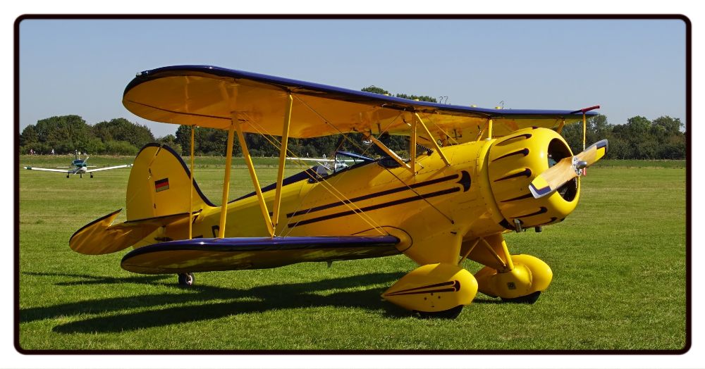 Yellow Waco Biplane Desk Mat