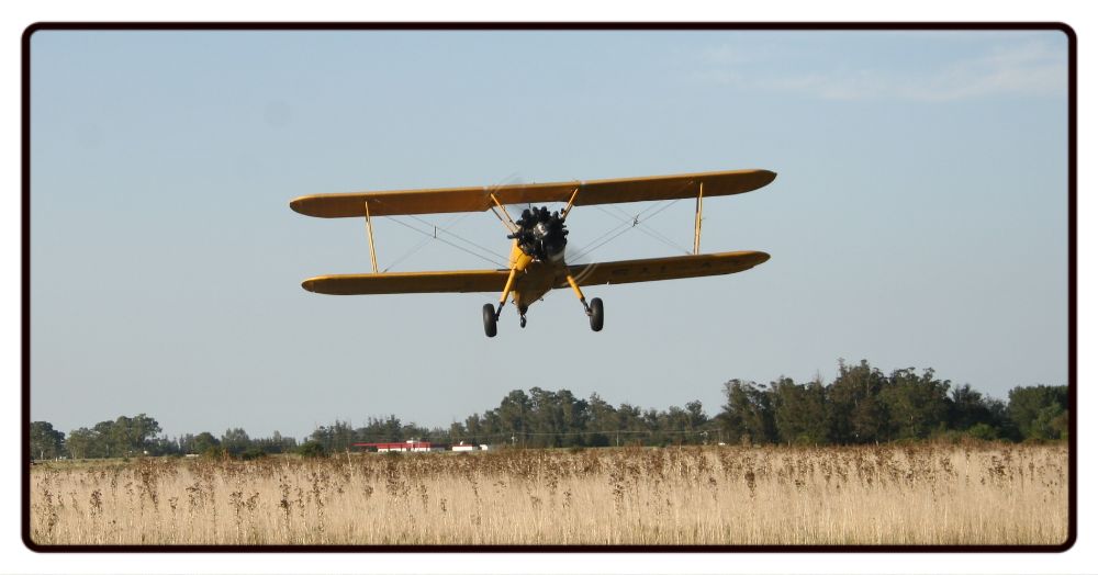 Stearman Plane Over a Field Desk Mat